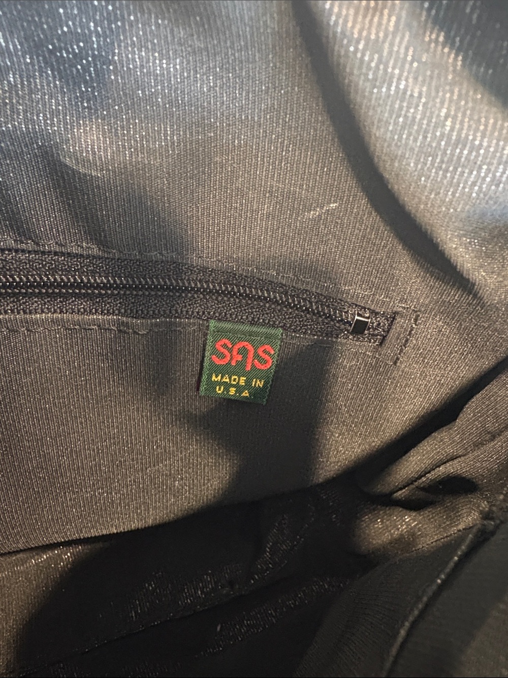 SAS Black Handbag with Green Logo Tag